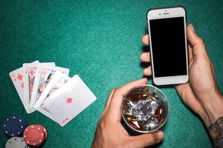 Tampilan layar home aplikasi mobile juragan prediksi menampilkan grid permainan slot dan tombol deposit